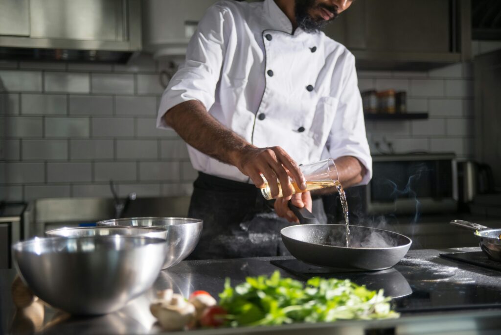 Chef preparing food in a restaurant kitchen